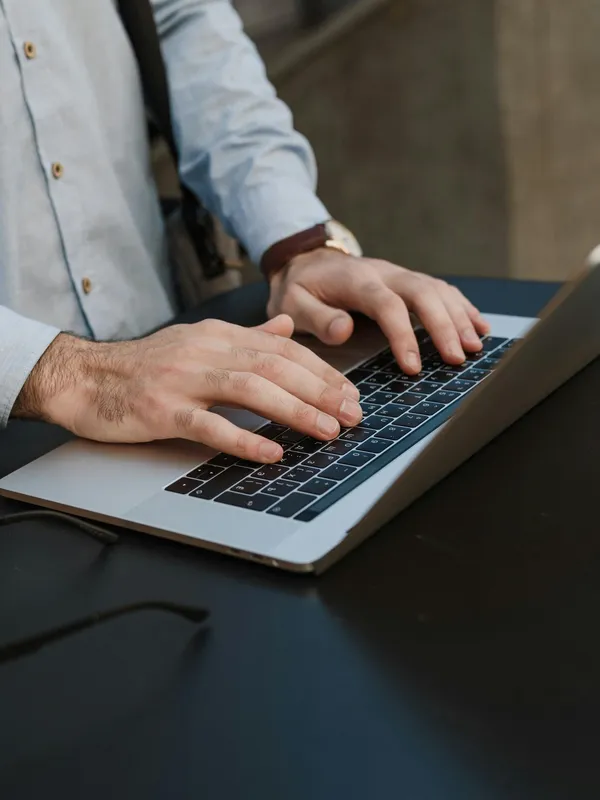 Medical billing and coding specialist reviewing documents.